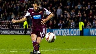 Hearts player Dale Carrick scores a penalty