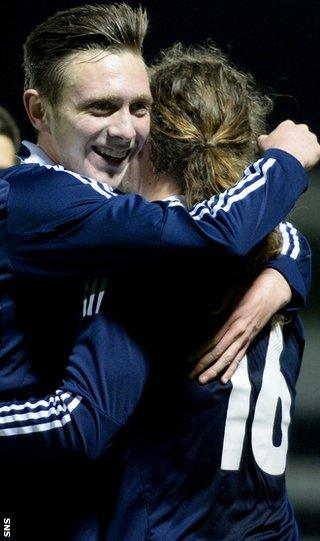 Scotland's Jordan McGhee (left) congratulates Stevie May