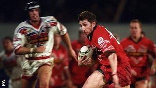 Jonathan Davies launches an attack for Wales against England