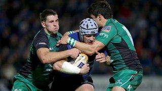 Shane Jennings is tackled by Craig Ronaldson and Tiernan o'Halloran