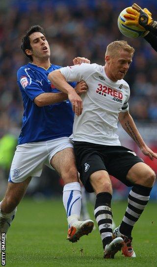 Cardiff’s Peter Whittingham battles with Swansea defender Garry Monk in 2011