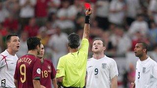 Wayne Rooney receives a red card for standing on Ricardo Carvalho in the 2006 World Cup quarter-final against Portugal, which England lost on penalties