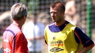 England's captain David Beckham (right) talking to manager Sven-Goran Eriksson during a training session in 2001