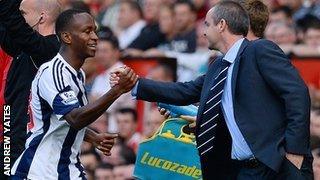 Berahino celebrates with Baggies boss Steve Clarke