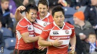 Japan's Kenki Fukuoka (left) twice brought his team back into the match