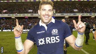 Sean Lamont, scorer of Scotland's sixth against Japan, celebrates at the final whistle