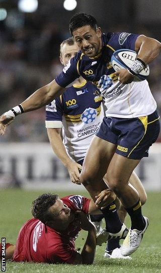 Mike Harris tackles Christian Leali'ifano in action for their clubs