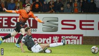 Andy Robertson watches his impressive strike go into the far corner and give United a 2-1 lead