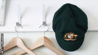 A baggy green hangs in the Australia cricket team's changing room.