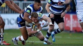 Matt Jess is tackled by Anthony Watson