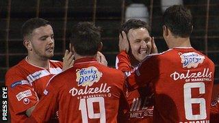 Darren Murray and Gary Twigg scored Portadown's goals at the Oval