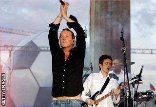 Simple Minds performed at the fan party at Berlin's Brandenburger Gate before the launch of the 2006 World Cup in Germany