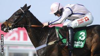 Sam Twiston-Davies riding Dover's Hill clears the last to win The Mobile Betting At paddypower.com Handicap Steeple Chase at Sandown racecourse on March 10, 2012.