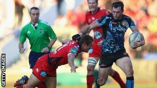 Luke Arscott tries to evade Jonny Wilkinson's tackle