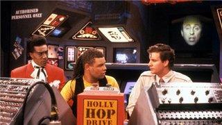 Danny John-Jules playing the Cat (l) in Red Dwarf