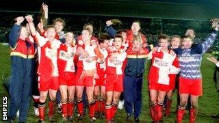 Kidderminster Harriers players celebrate their 2-1 FA Cup third round win at St Andrew's