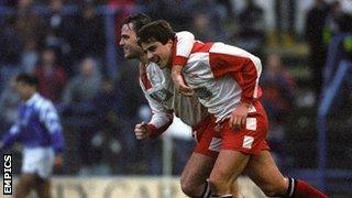 Kidderminster Harriers goal heroes Jon Purdie (left) and Neil Cartwright celebrate at St Andrew's, January 1994