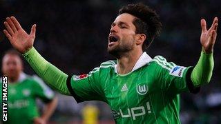 Diego of Wolfsburg celebrates scoring a goal during the Bundesliga match between Borussia Moenchengladbach and VfL Wolfsburg held at Borussia-Park on December.