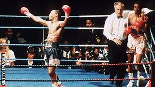 Chris Eubank celebrates his victory against Michael Watson (right) in their second WBO Middleweight title fight, at White Hart Lane, London, 21st September 1991.