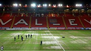 The Valley's rain-soaked pitch