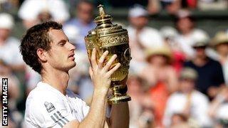 Andy Murray lifts the Wimbledon trophy