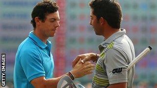 Pablo Larrazabal (right) is congratulated by Rory Mcilroy after winning the Abu Dhabi HSBC Golf Championship