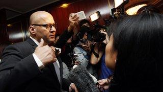 Peter Pannu speaks to reporters following the EGM at the Shangri-La Hotel in Hong Kong (5 February 2014)