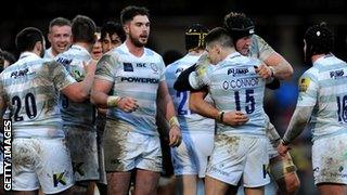 Australian James O'Connor leads the London Irish celebrations after they beat Wasps