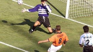 Dennis Bergkamp scores against Argentina