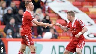 Adam Rooney (left) celebrates his goal with Jonny Hayes as Aberdeen defeat Dumbarton 1-0.