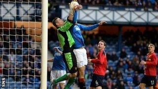 Albion Rovers players felt goalkeeper Neil Parry was fouled by Bilel Mohsni (right) in the lead up to Rangers' equaliser