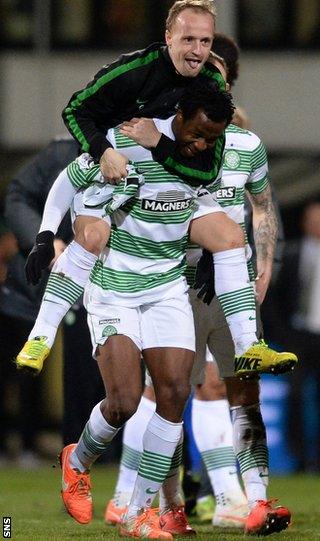 Leigh Griffiths and Efe Ambrose celebrate Celtic's title win