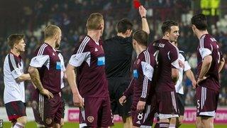 Danny Wilson was sent off as Hearts drew 1-1 with Aberdeen