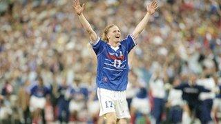 Emmanuel Petit celebrates after scoring for France against Brazil