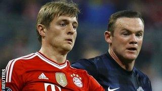 Toni Kroos (left) may be teaming up with Wayne Rooney at Manchester United next season