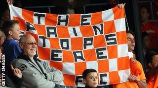 Luton fans with a flag