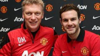 Manchester United's new record signing Juan Mata (right) with manager David Moyes