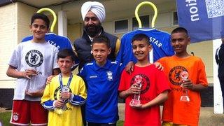 Chelsea Asian Star winners from left - Qasim Khan, Ibrahim Khan, Rayhaan Majid and Kamran Khalid with their trophies and previous winner Sam Khan (front centre)