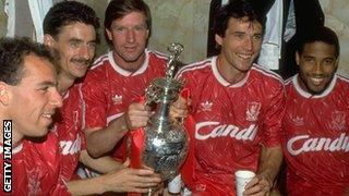 Alan Hansen, Ian Rush and Ronnie Whelan share the First Division trophy