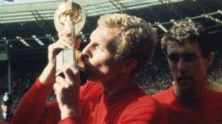 Bobby Moore kisses the Jules Rimet trophy after England beat West Germany to win the 1966 World Cup