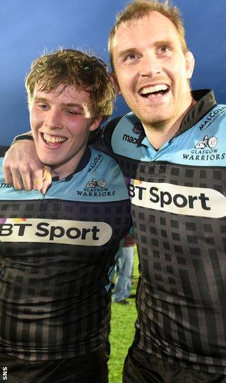 Man of the match Jonny Gray and Al Kellock celebrate Glasgow's win