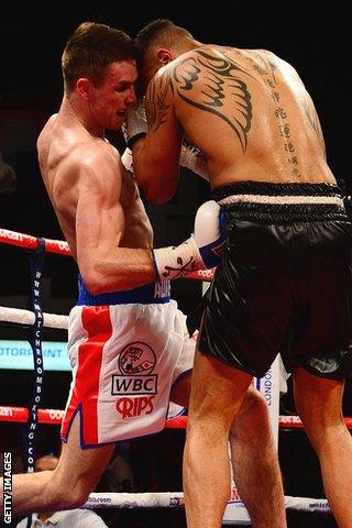 Callum Smith (L) lands a body shot on Tobias Webb in their WBC International super-middleweight fight