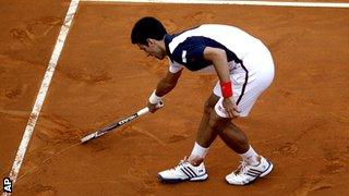 Djokovic drew a heart on the court moments after converting match point