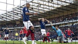 Scotland's Chris Iwelumo missed a glorious chance against Norway