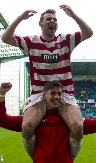 Tony Andreu is hoisted in front of the Hamilton supporters