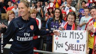 Arsenal fans display a banner for Shelley Kerr