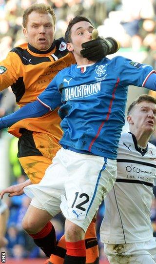 Raith Rovers and Rangers players clash during the Ramsdens Cup final