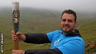 Aled Sion Davies with baton