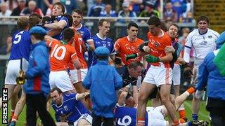 The brawl breaks out before the throw-in at the Athletic Grounds