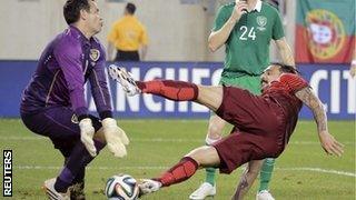 Portugal's Hugo Almeida scores against Ireland